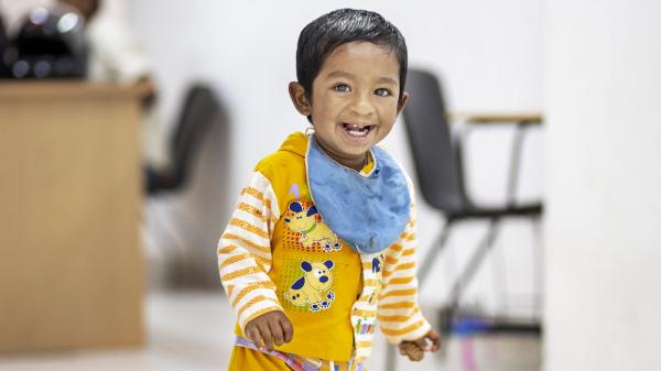 Image of young child smiling